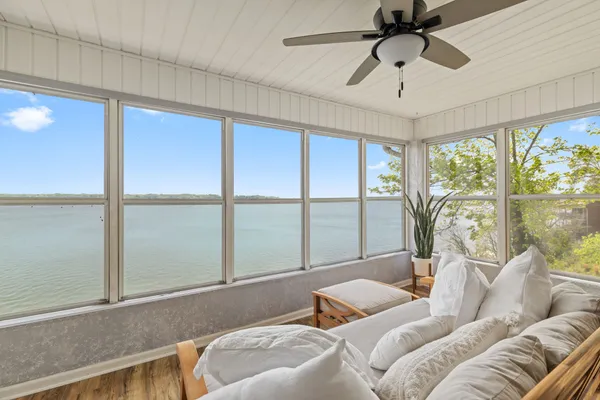 a bedroom with a bed a bookshelf and a bookshelf