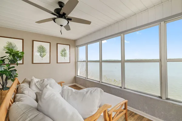 a bedroom with a bed and a desk