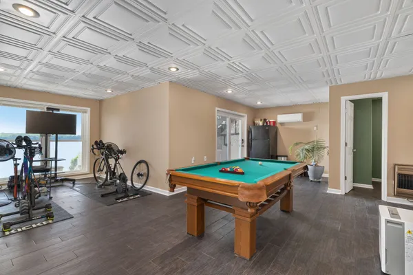 a view of a houses with outdoor space and street view