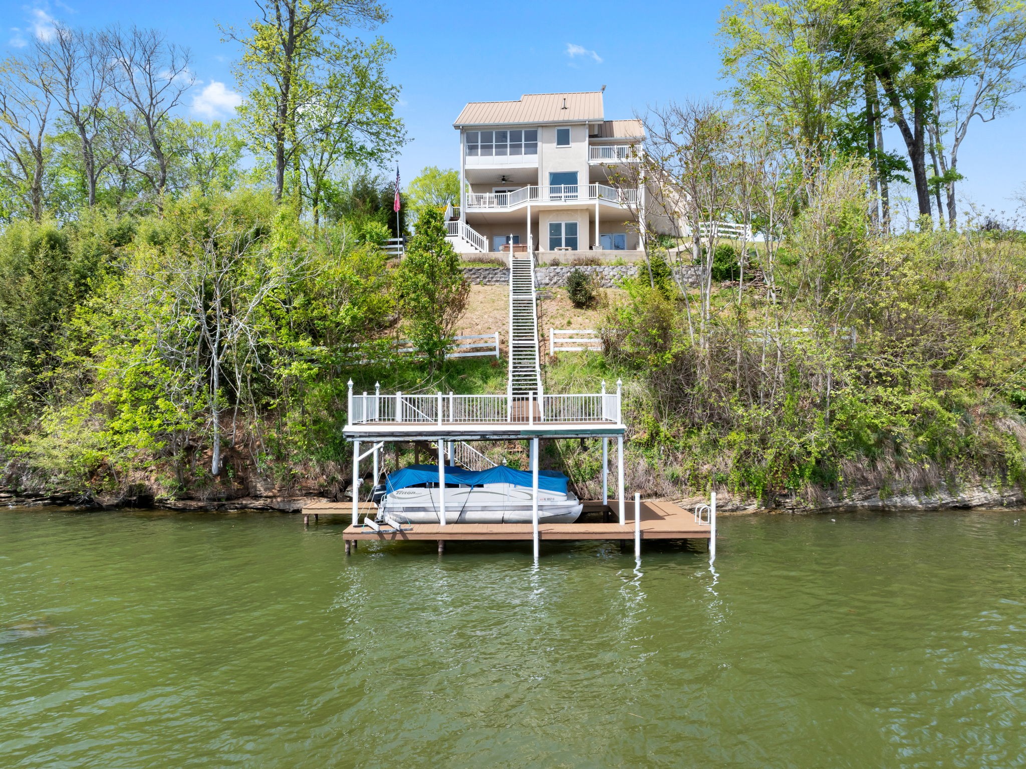 920 County Road 33 Killen, AL 35645 - Photo 4 of 80 a view of a water with boats and trees in the background