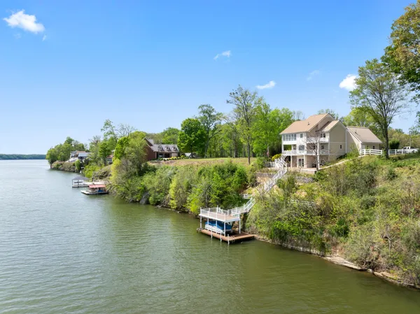 a view of a lake with a houses