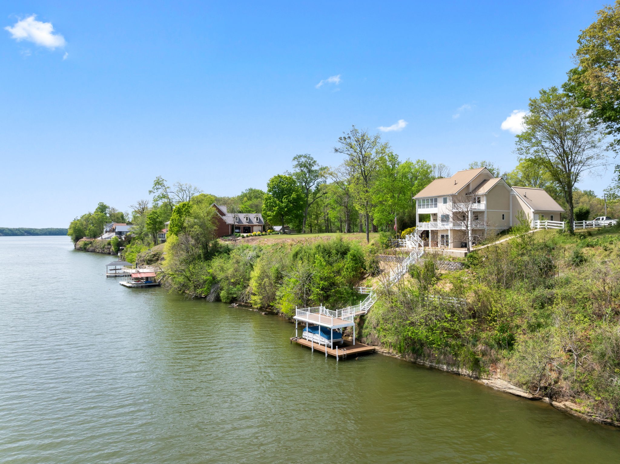 920 County Road 33 Killen, AL 35645 - Photo 48 of 80 a view of a lake with a house in the background