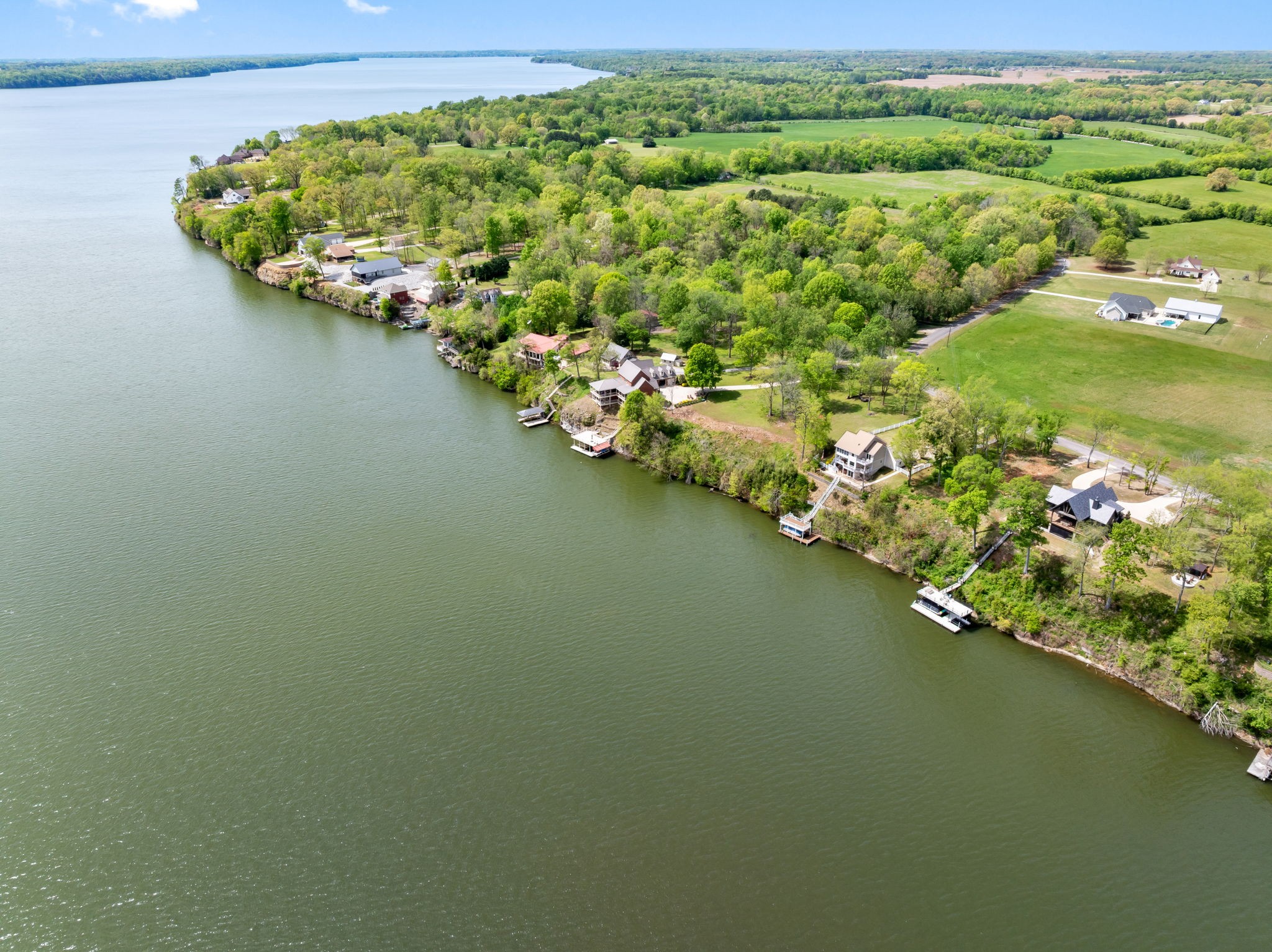 920 County Road 33 Killen, AL 35645 - Photo 77 of 80 a view of a lake with a houses