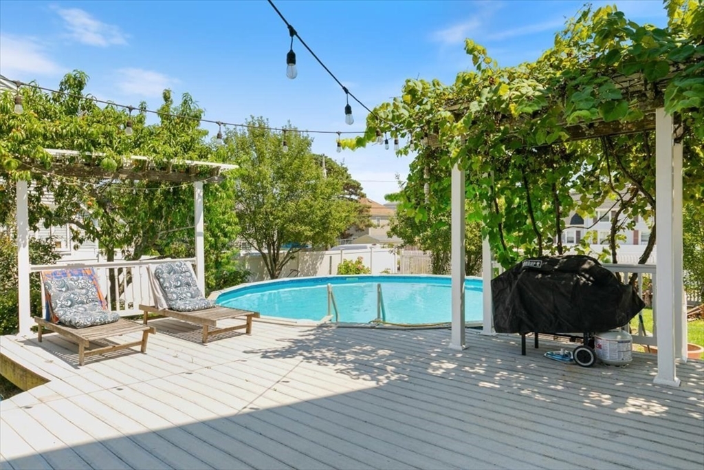 16 Crescent Avenue Beverly, MA 01915 - Photo 11 of 37 a view of a swimming pool with a patio