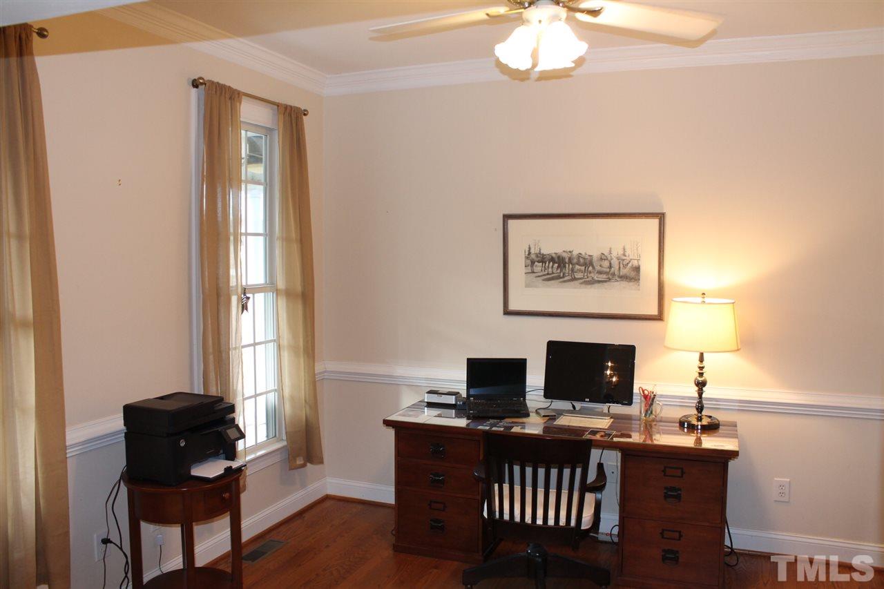 2601 Federal Road Benson, NC 27504 - Photo 11 of 24 a view of a workspace with furniture and a window