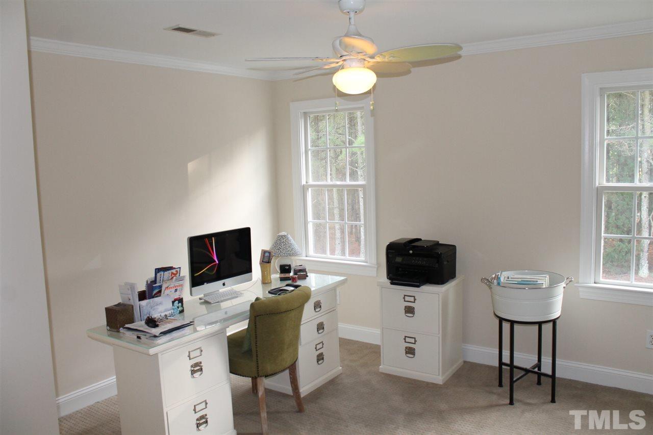 2601 Federal Road Benson, NC 27504 - Photo 18 of 24 a view of a workspace with furniture and a window