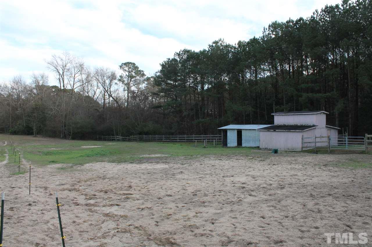 2601 Federal Road Benson, NC 27504 - Photo 24 of 24 a backyard of a house with lots of green space