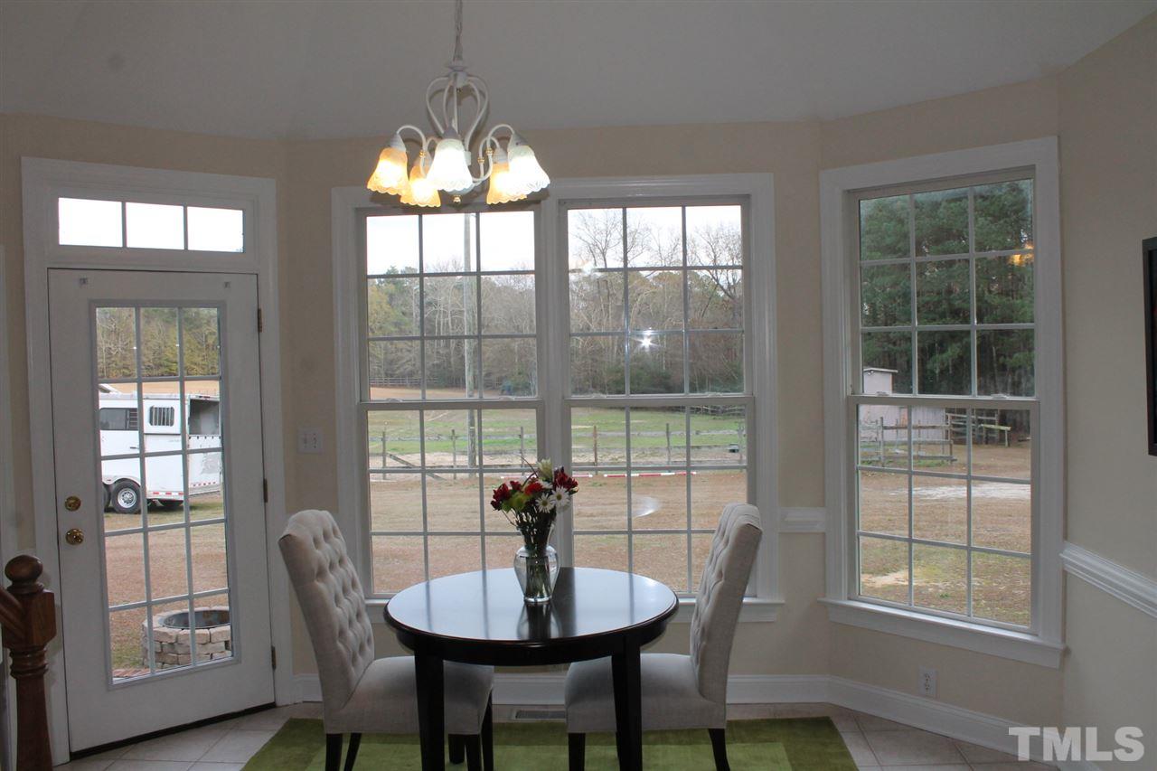 2601 Federal Road Benson, NC 27504 - Photo 8 of 24 a dining room with furniture window and wooden floor