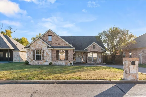 a front view of house with yard