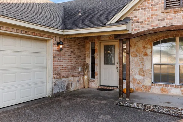 a view of a lake with a yard