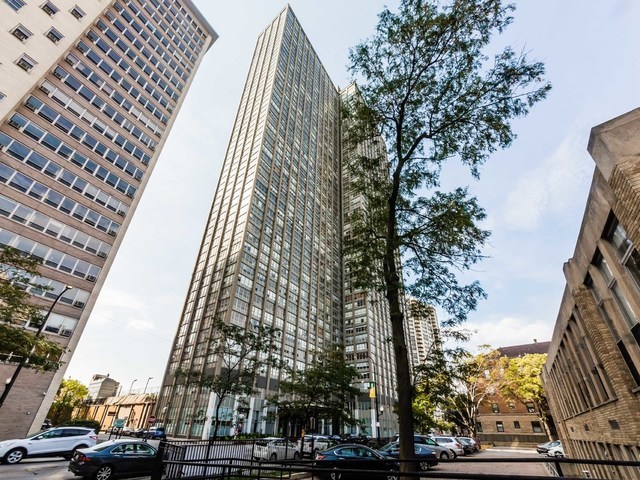 655 West Irving Park Road, Unit 710 Chicago, IL 60613 - Photo 1 of 24 an aerial view of a multi story parking building