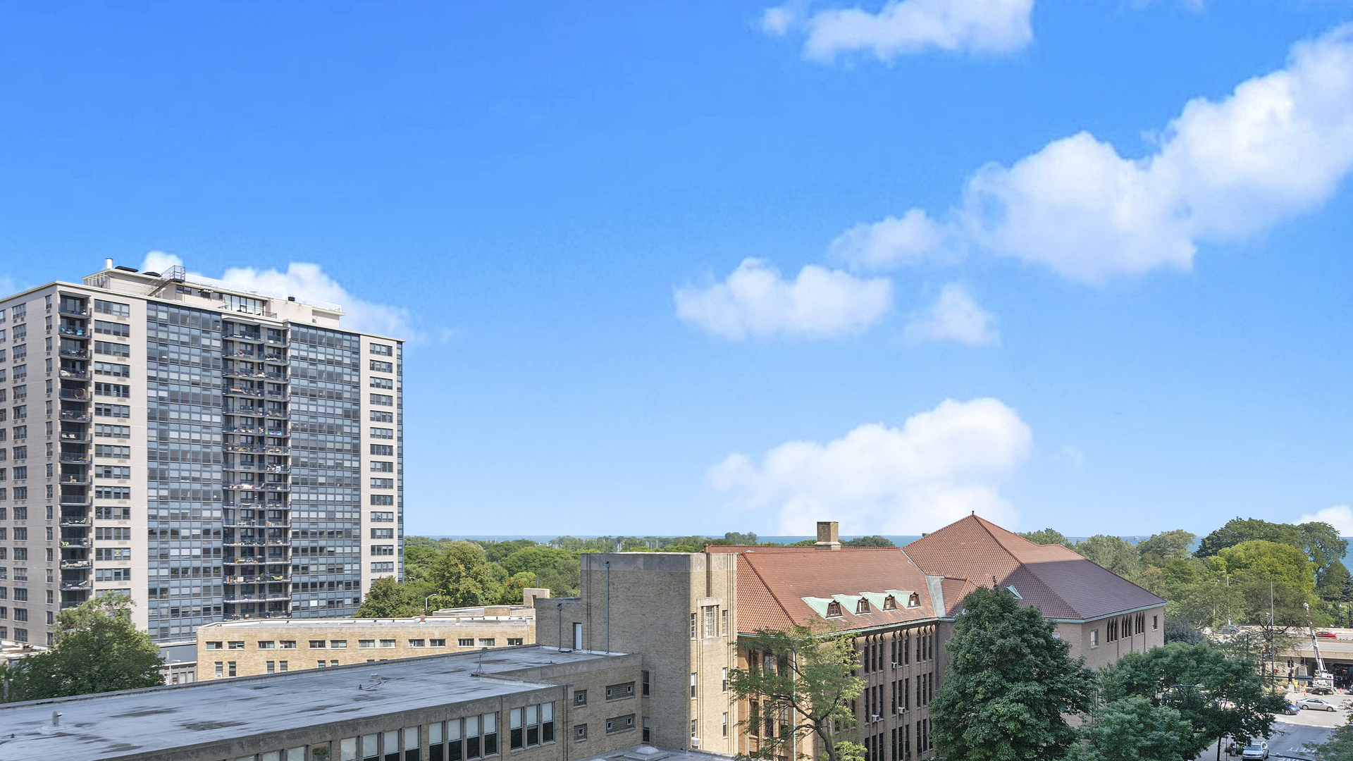 655 West Irving Park Road, Unit 710 Chicago, IL 60613 - Photo 16 of 24 a view of a city with tall buildings