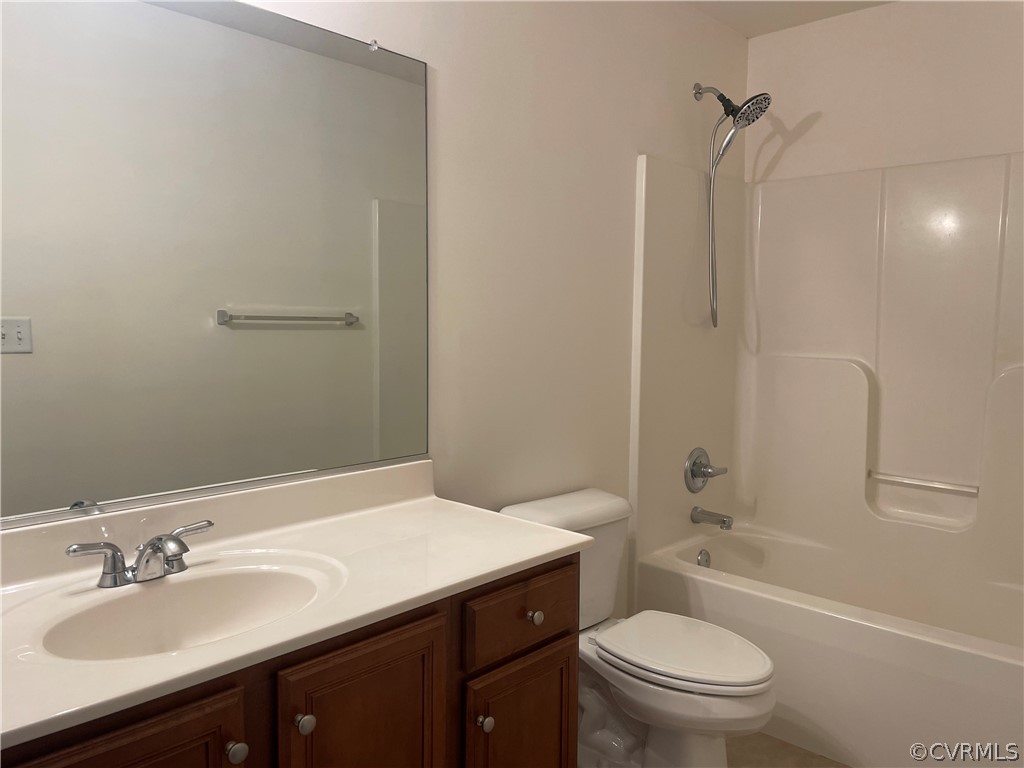 13111 Eppes Falls Road Chesterfield, VA 23838 - Photo 12 of 19 a bathroom with a sink toilet vanity and shower
