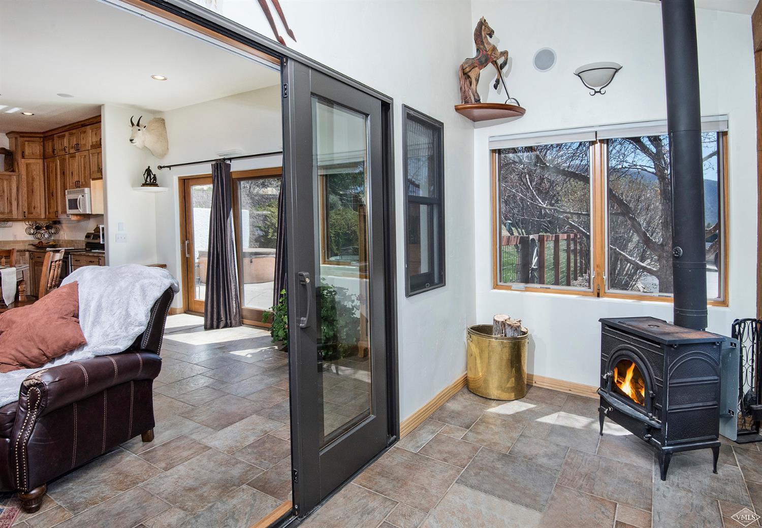 1720 Castle Peak Ranch Road Eagle, CO 81631 - Photo 11 of 25 a view of a livingroom with furniture and windows