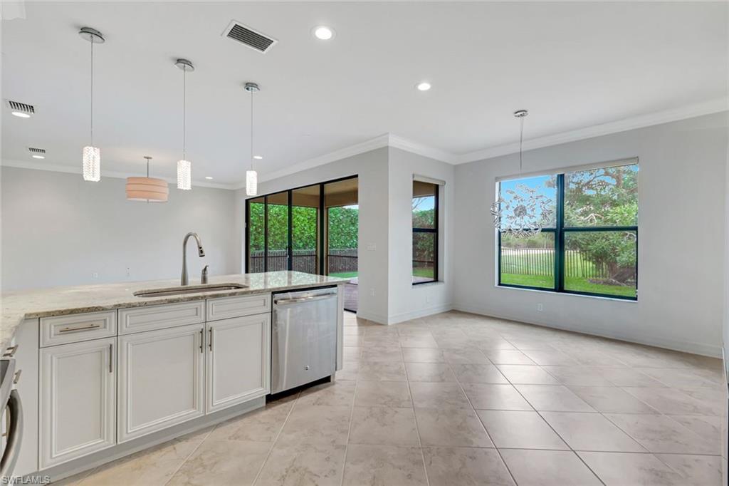 a large kitchen with cabinets