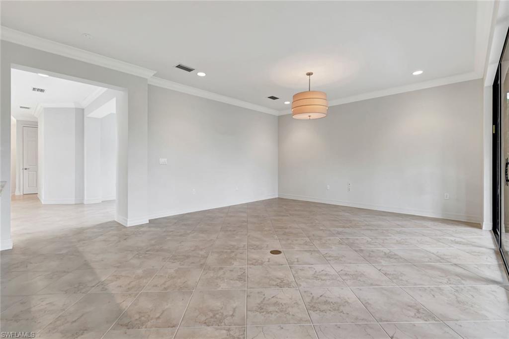 3430 Tigris Lane Naples, FL 34119 - Photo 11 of 48 a view of an empty room