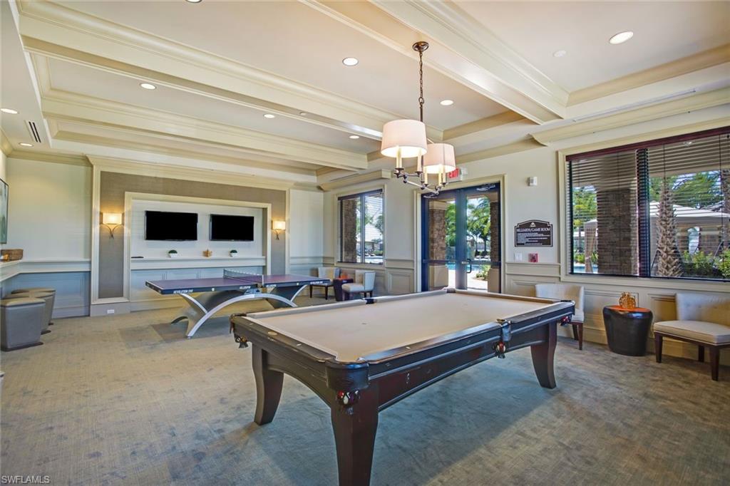 3430 Tigris Lane Naples, FL 34119 - Photo 44 of 48 a room with pool table and flat screen tv