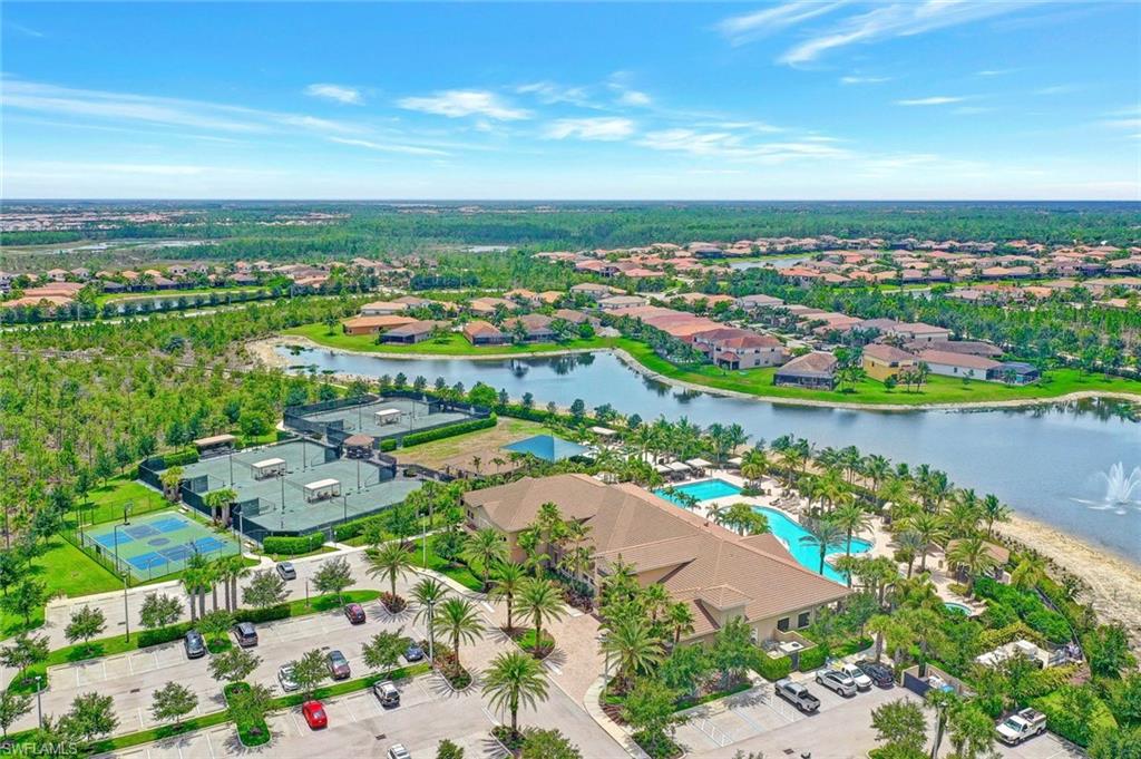 3430 Tigris Lane Naples, FL 34119 - Photo 45 of 48 an aerial view of residential houses with outdoor space