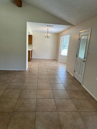 a view of a livingroom with a staircase