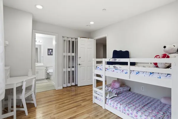 a room with furniture and wooden floor