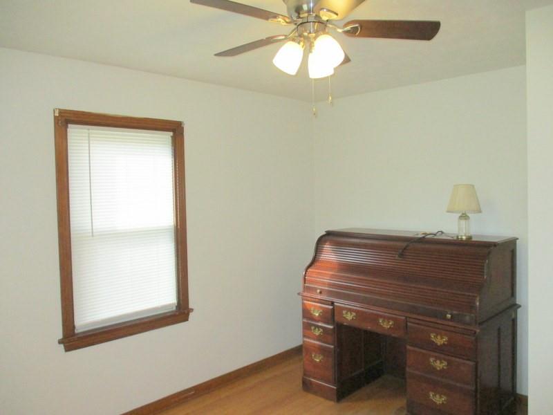 1492 Merriman Road Ambridge, PA 15003 - Photo 28 of 43 a view of room with window and wooden floor