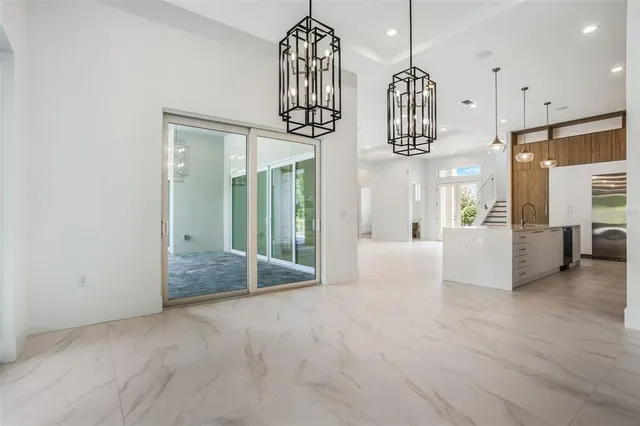 a view of an entryway with chandelier