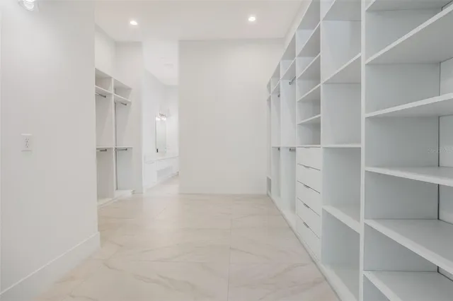a view of an empty walk in closet