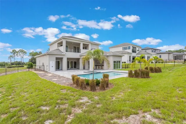 a view of a house with a swimming pool