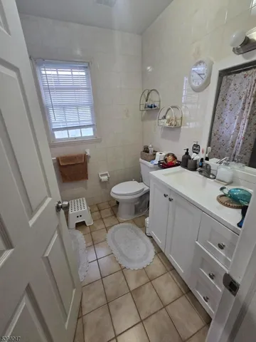 a room with wooden floor and furniture