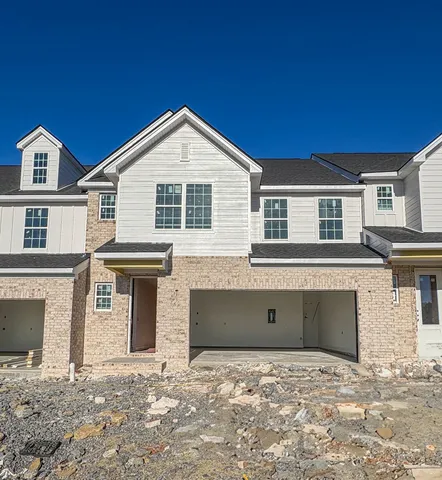 a front view of a house with windows