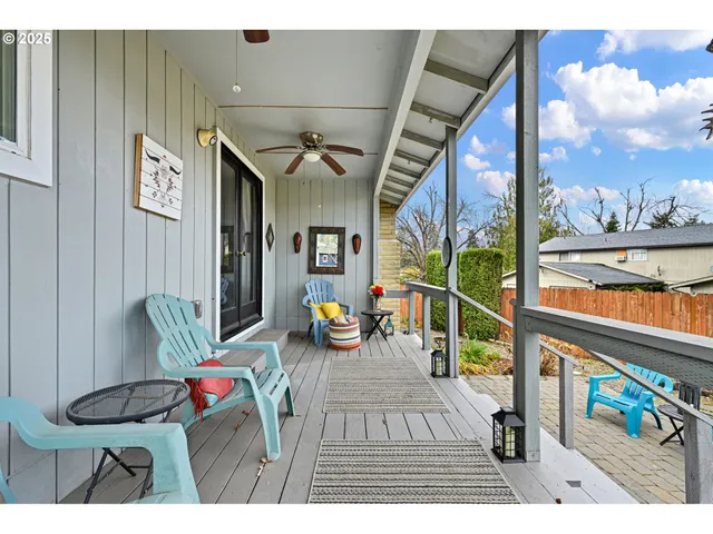 a view of a balcony and furniture