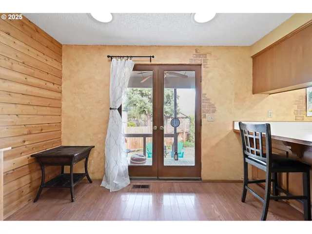 a workspace with furniture and window