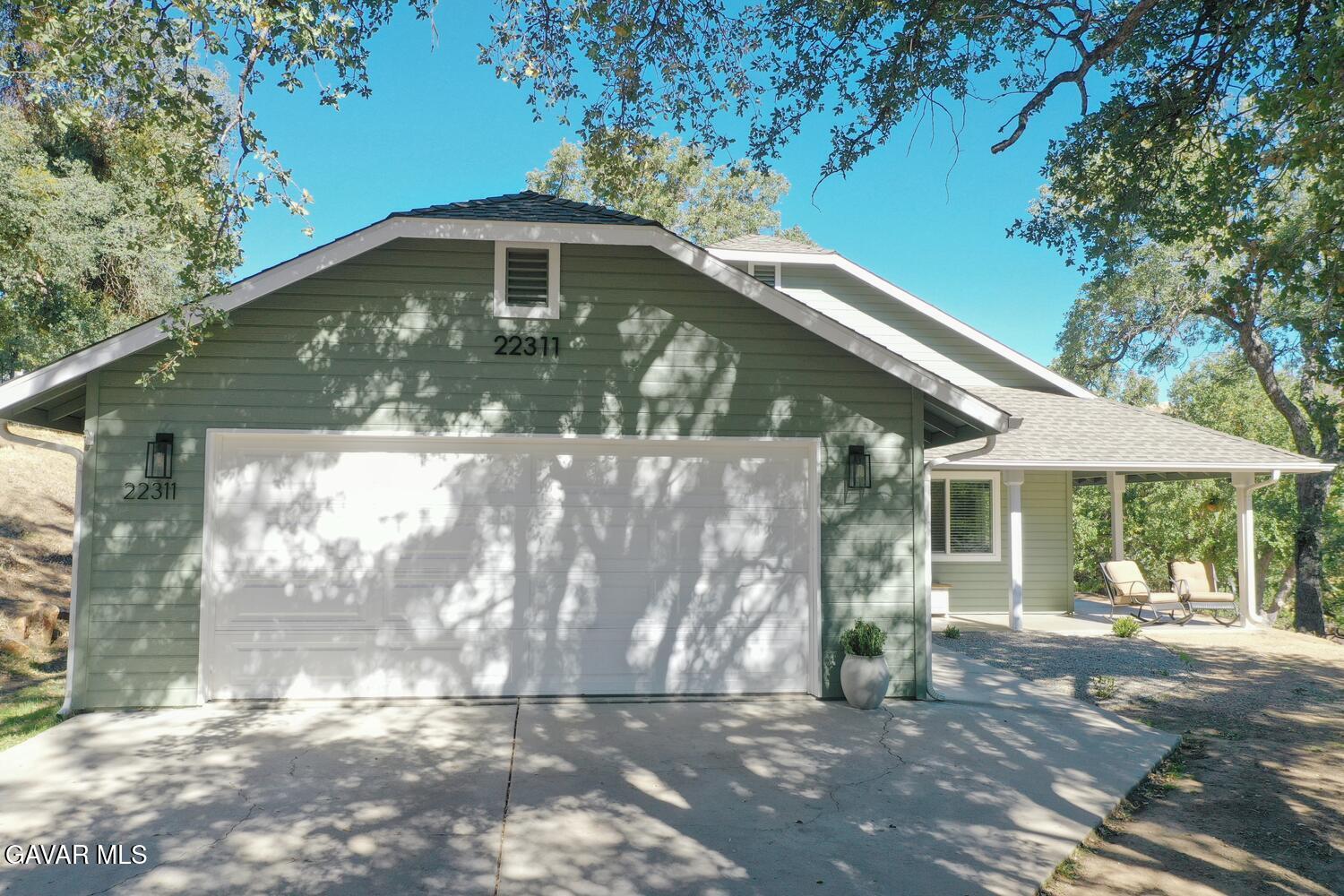 22311 Zurich Drive Tehachapi, CA 93561 - Photo 30 of 37 a front view of a house with a yard