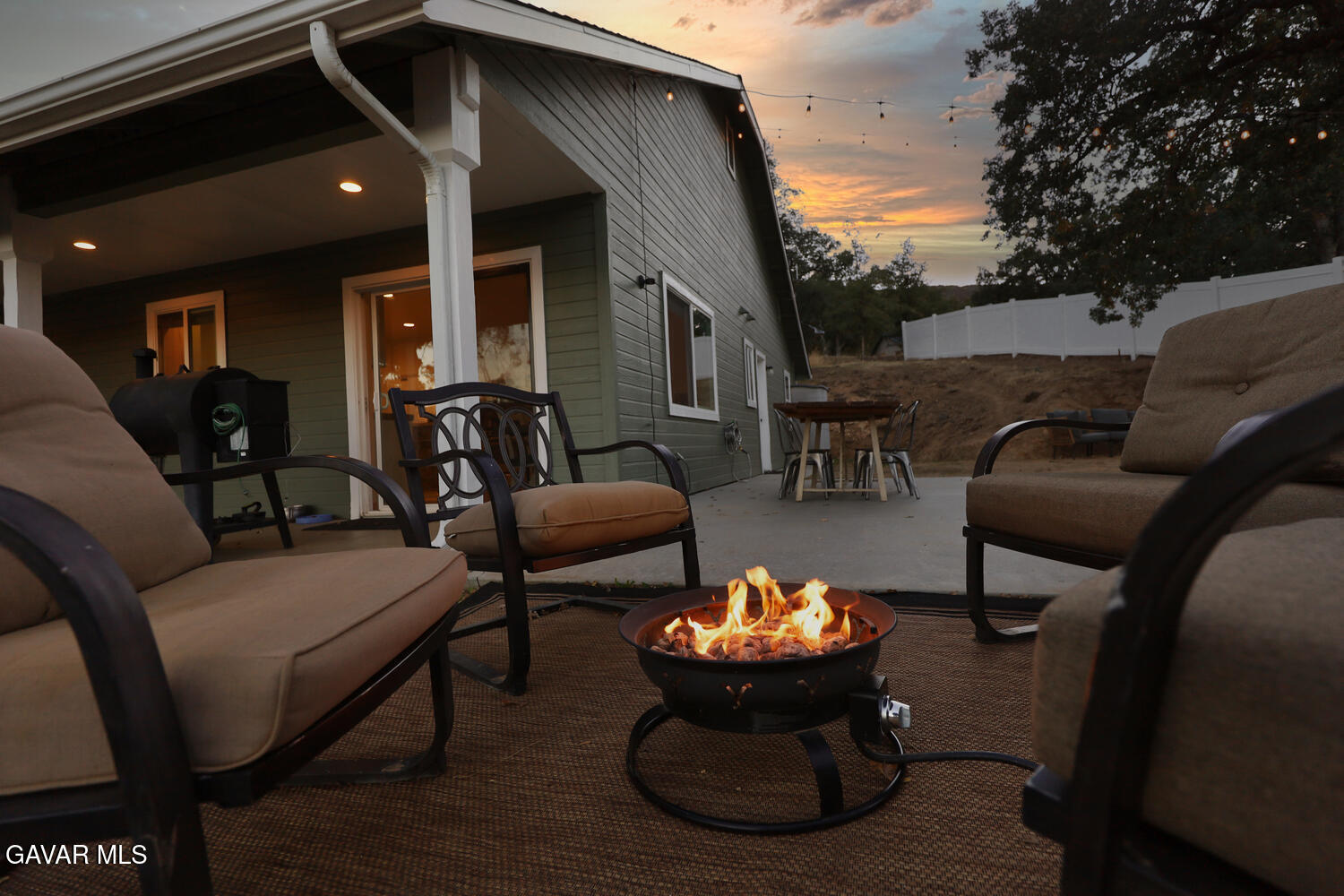 22311 Zurich Drive Tehachapi, CA 93561 - Photo 36 of 37 a outdoor living space with furniture and a fireplace
