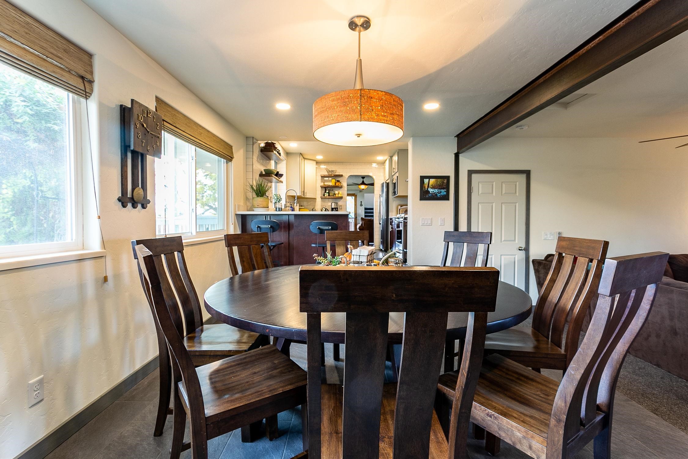 445 35 Road Palisade, CO 81526 - Photo 12 of 42 a view of a dining room with furniture window and wooden floor
