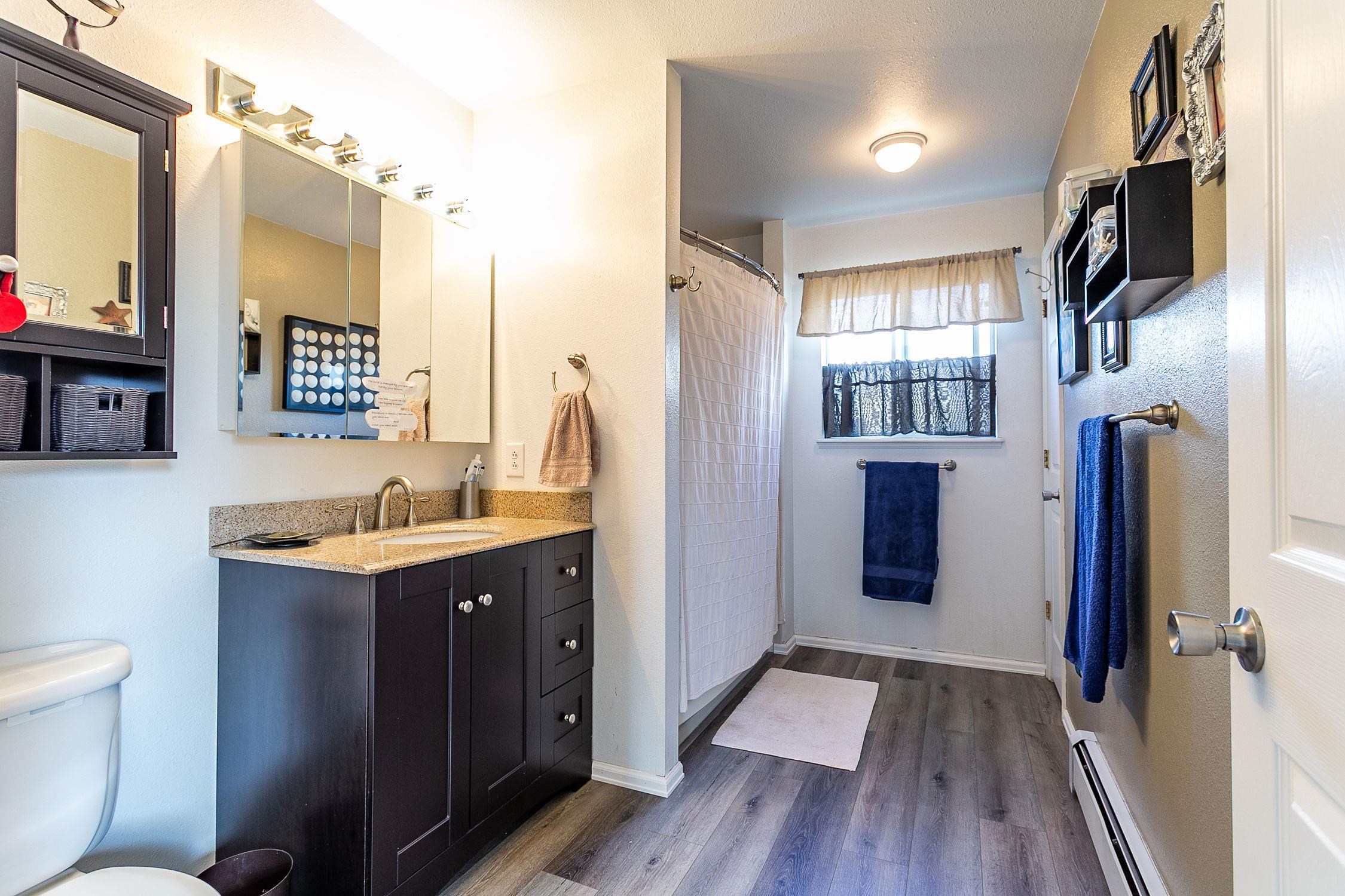 445 35 Road Palisade, CO 81526 - Photo 20 of 42 a view of a kitchen with a sink and a refrigerator