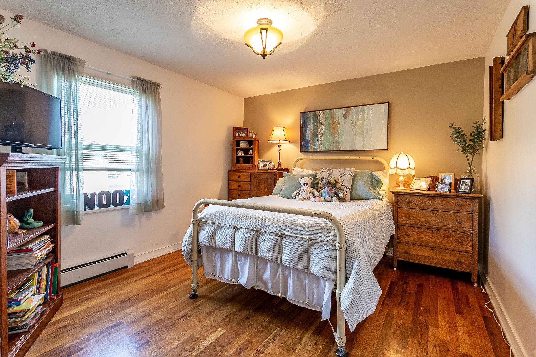 445 35 Road Palisade, CO 81526 - Photo 22 of 42 a bedroom with a bed and a window