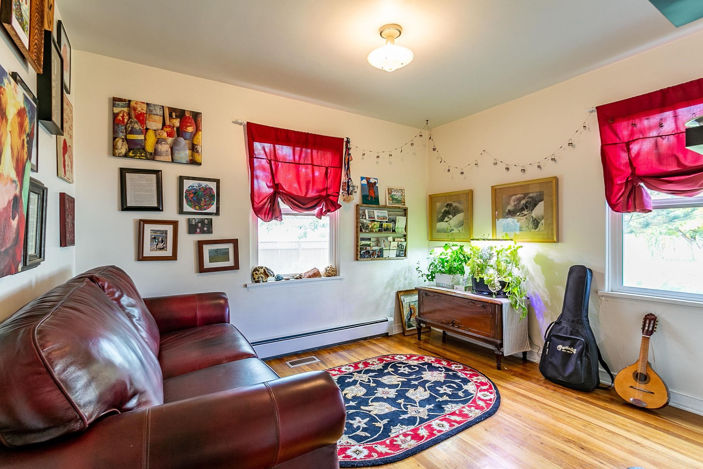445 35 Road Palisade, CO 81526 - Photo 27 of 42 a living room with furniture and a couch