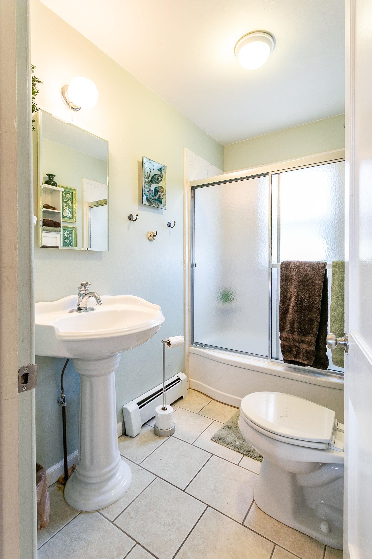445 35 Road Palisade, CO 81526 - Photo 29 of 42 a bathroom with a sink a toilet and shower