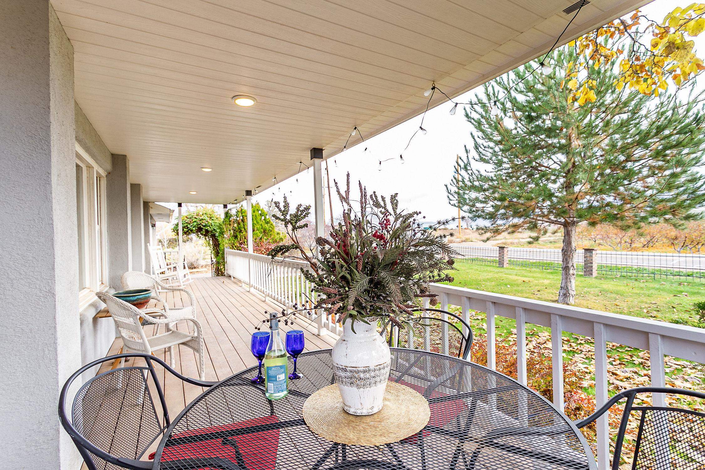 445 35 Road Palisade, CO 81526 - Photo 35 of 42 a view of balcony with furniture and garden