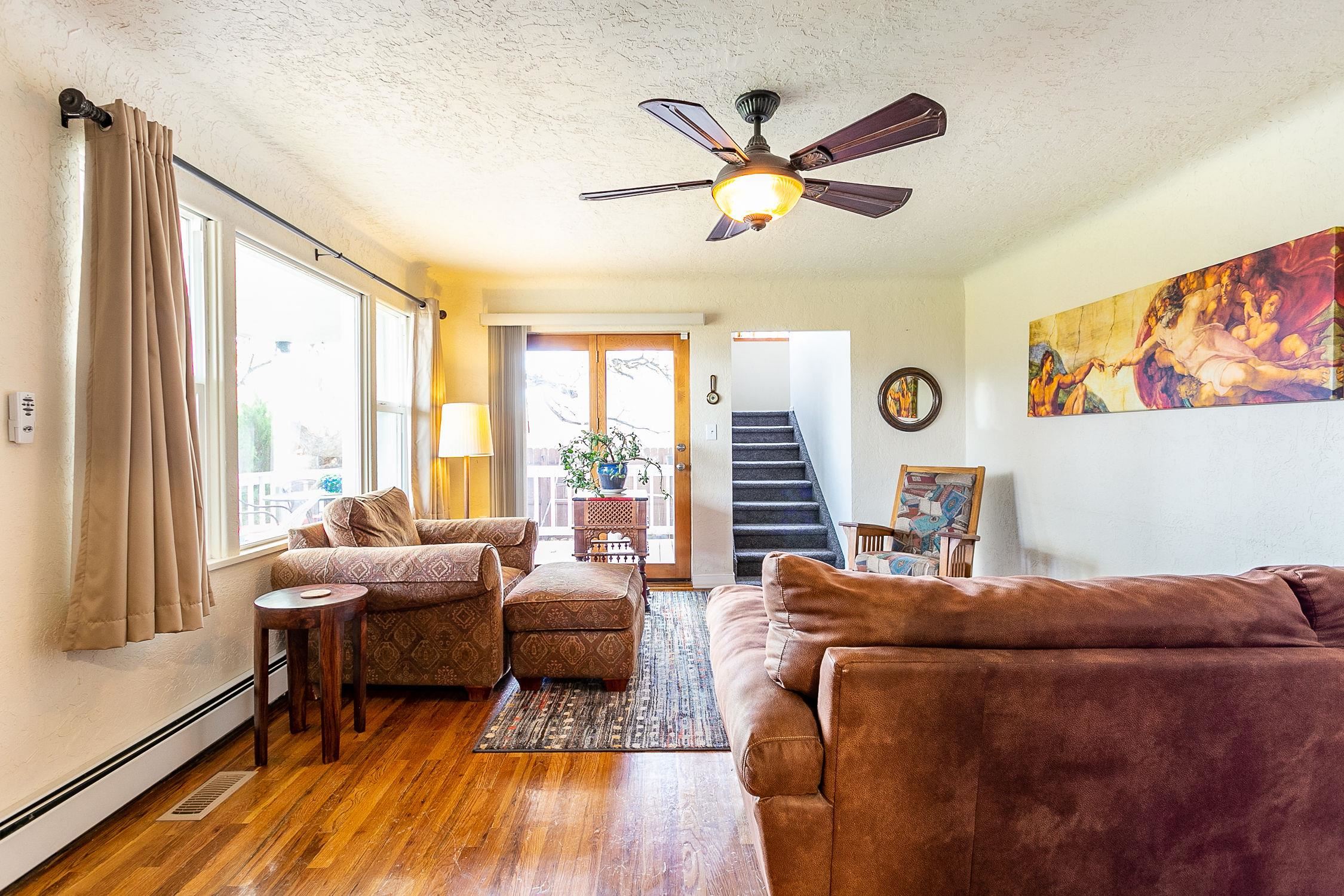 445 35 Road Palisade, CO 81526 - Photo 6 of 42 a living room with furniture and a large window