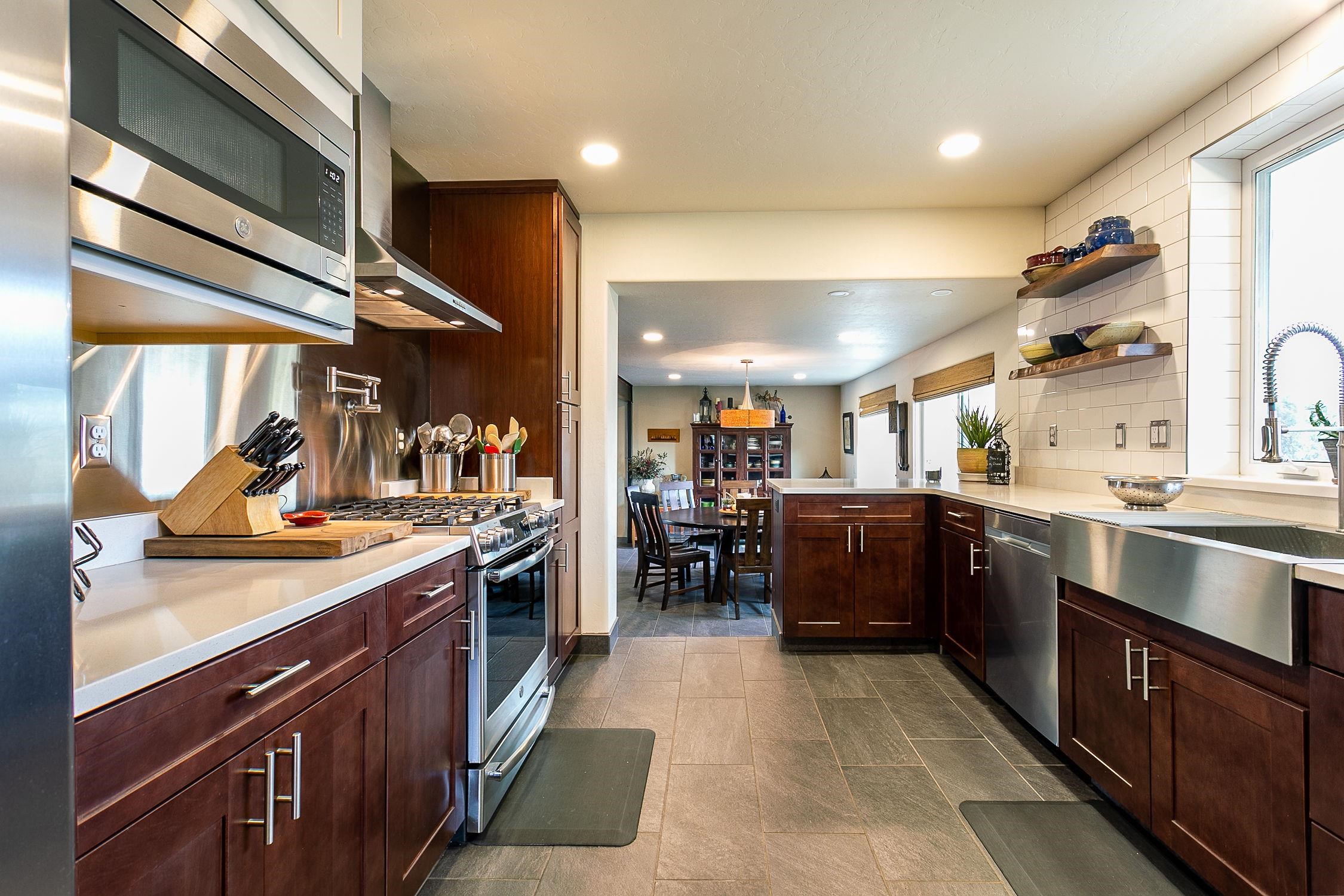 445 35 Road Palisade, CO 81526 - Photo 8 of 42 a kitchen with lots of counter top space