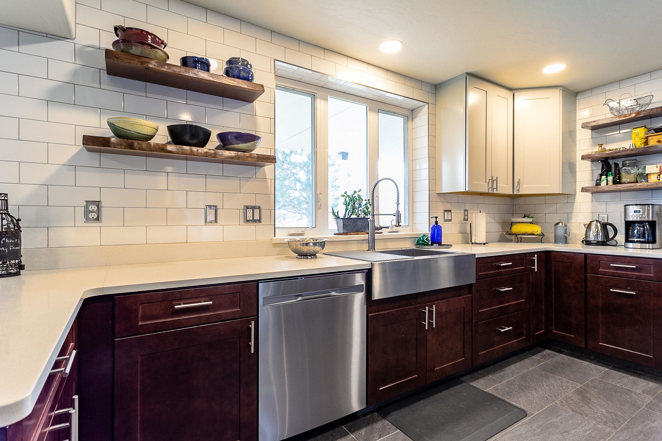 445 35 Road Palisade, CO 81526 - Photo 9 of 42 a kitchen with a sink and cabinets
