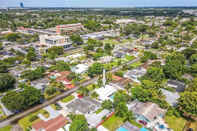 an aerial view of residential building with parking space