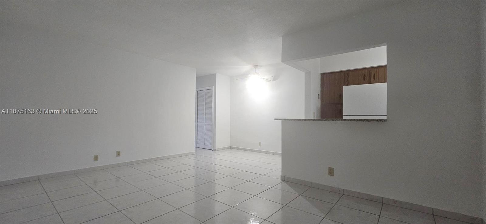 141 Northeast 10th Avenue, Unit 22C Hallandale Beach, FL 33009 - Photo 11 of 16 an empty room with windows