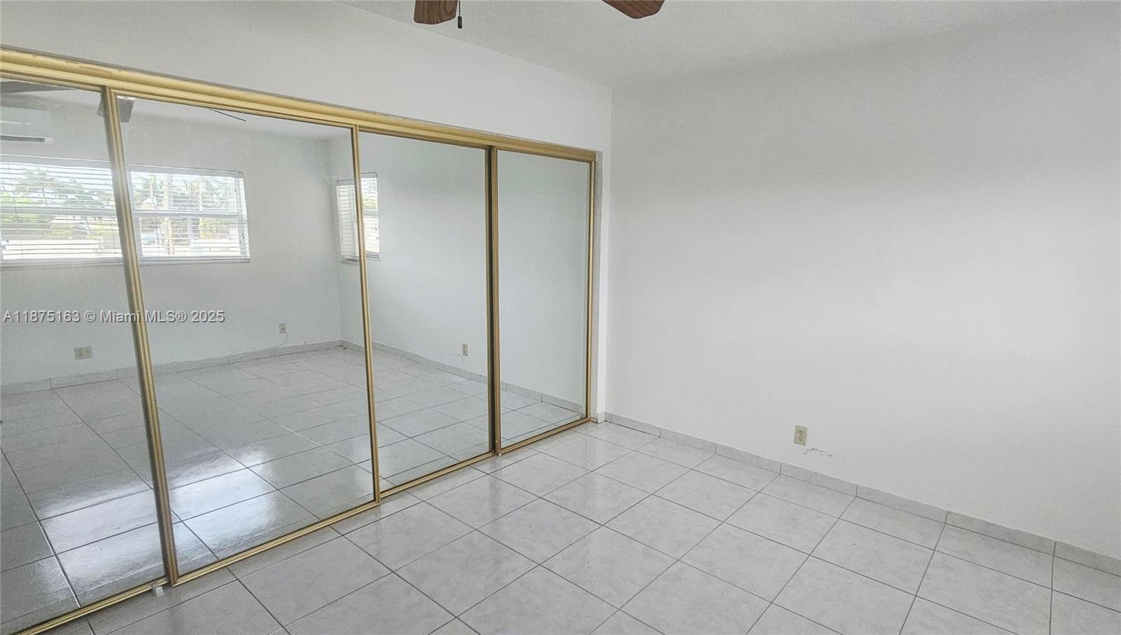 141 Northeast 10th Avenue, Unit 22C Hallandale Beach, FL 33009 - Photo 15 of 16 a view of an empty room
