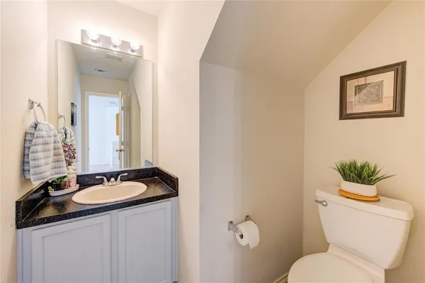 a bathroom with a sink and a toilet