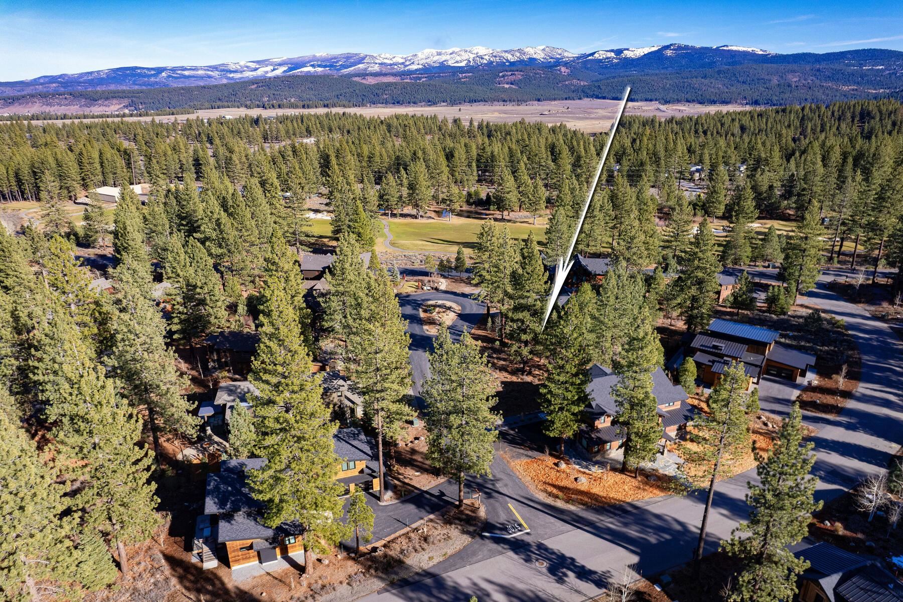 10020 Chaparral Court Truckee, CA 96161 - Photo 7 of 23 a view of a city with mountains in the background