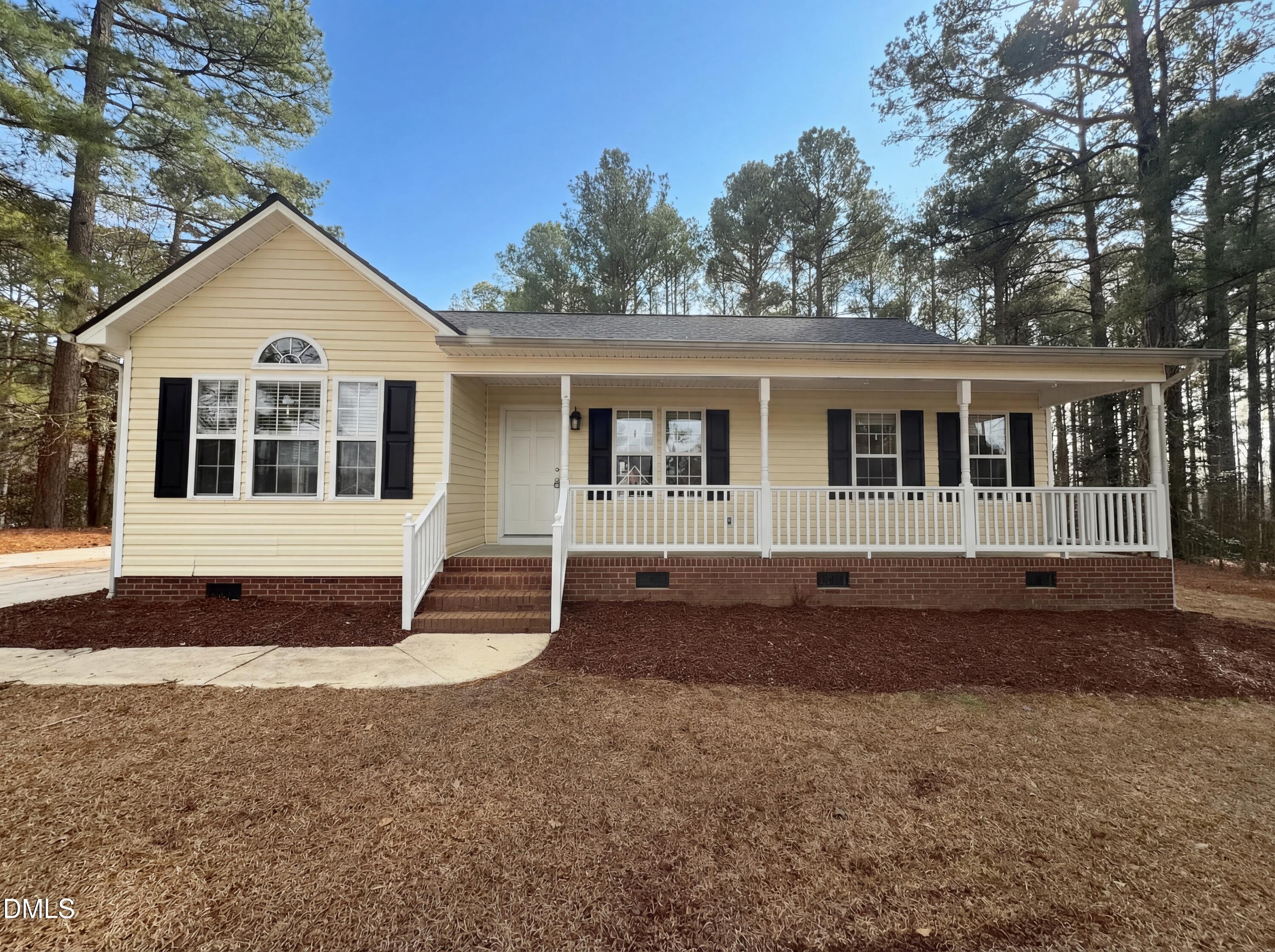 299 Greenleaf Road Angier, NC 27501 - Photo 1 of 15 a front view of a house with a yard