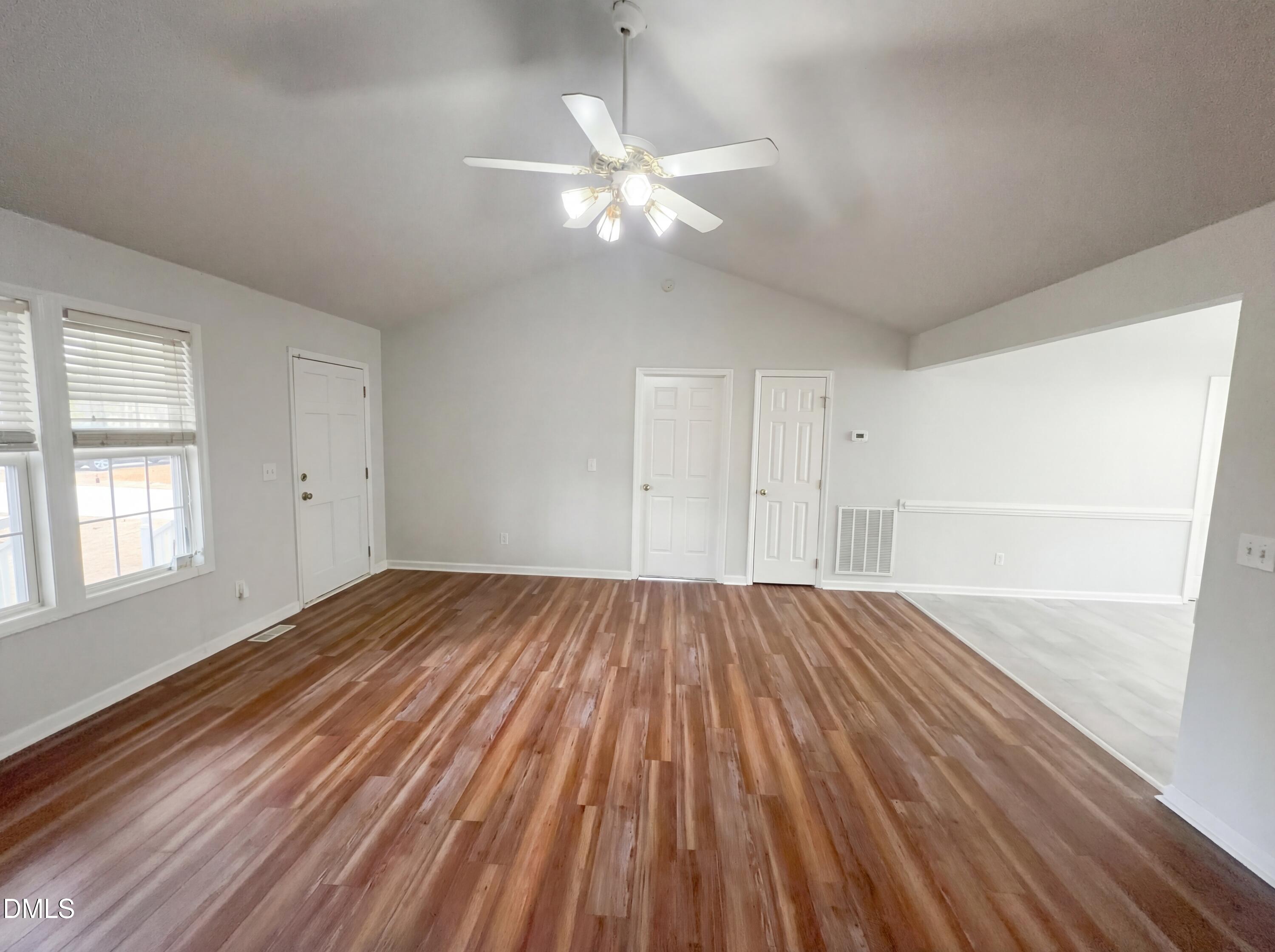 299 Greenleaf Road Angier, NC 27501 - Photo 14 of 15 wooden floor in an empty room with a window